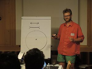 Matthew Bird presenting the O2k perspectives