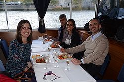 The group is dining on the River Thames
